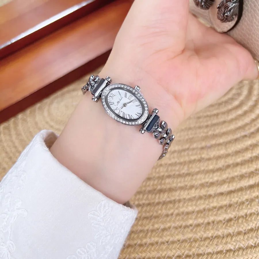 Fashionable Waterproof Quartz Women's Watch Mini Elliptical Dial Diamond Embedded Gold Hand Chain Stainless Steel Strap