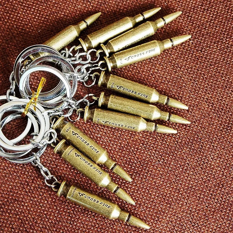 Factory sales metal simulation shell pistol tank aircraft hammer Bell ear spoon keychain uncle souvenir