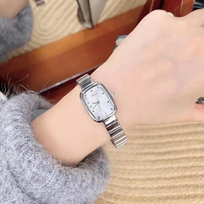 Minimalist Retro Roman Dial Quartz Steel Strap Watch Elegance Simplicity Fashionable Women's Square Face Mineral Glass Lens