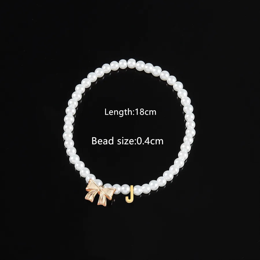 Elegant Classic Style Letter Bow Knot 304 Stainless Steel Artificial Pearl Copper Beaded Chain Beaded Bracelets Wholesale