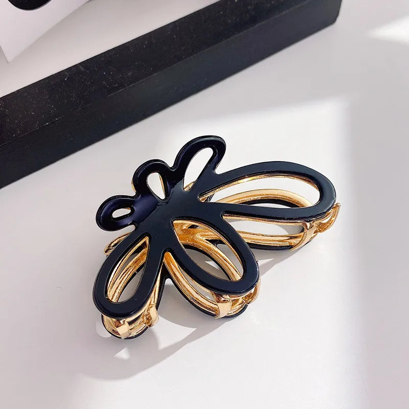 Women's Simple Style Butterfly Acetic acid sheets Hollow Out Hair Claws