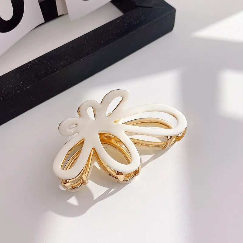 Women's Simple Style Butterfly Acetic acid sheets Hollow Out Hair Claws