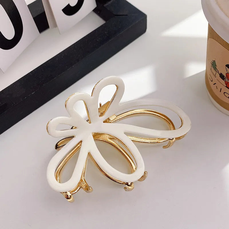 Women's Simple Style Butterfly Acetic acid sheets Hollow Out Hair Claws
