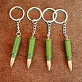 Factory sales metal simulation shell pistol tank aircraft hammer Bell ear spoon keychain uncle souvenir