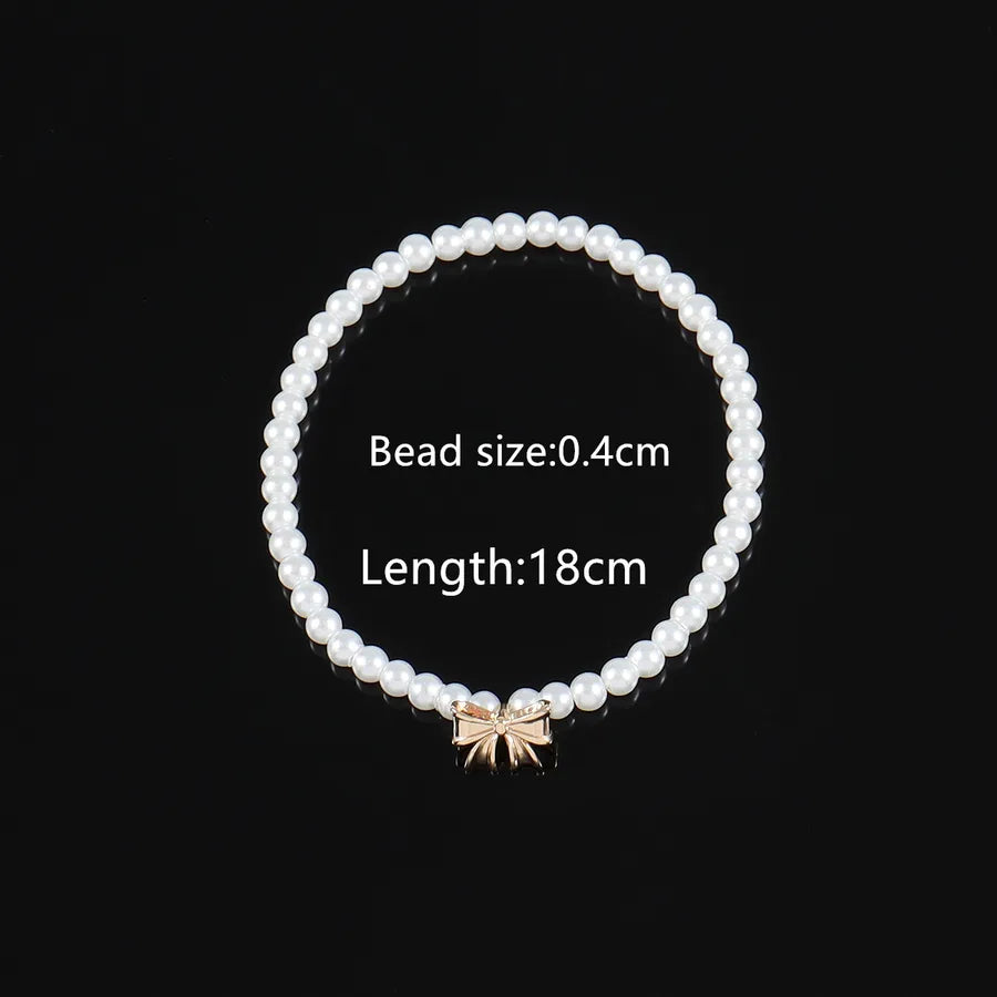 Elegant Simple Style Classic Style Bow Knot Artificial Pearl Copper Beaded Chain Beaded Bracelets Wholesale