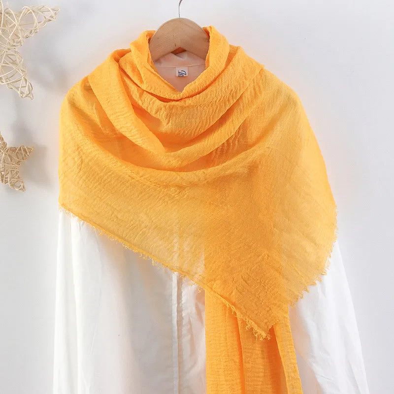Hot selling solid color pleated cotton and linen scarf  women's bag headscarf crumpled hair fringe bubble scarf women's scarf cover head