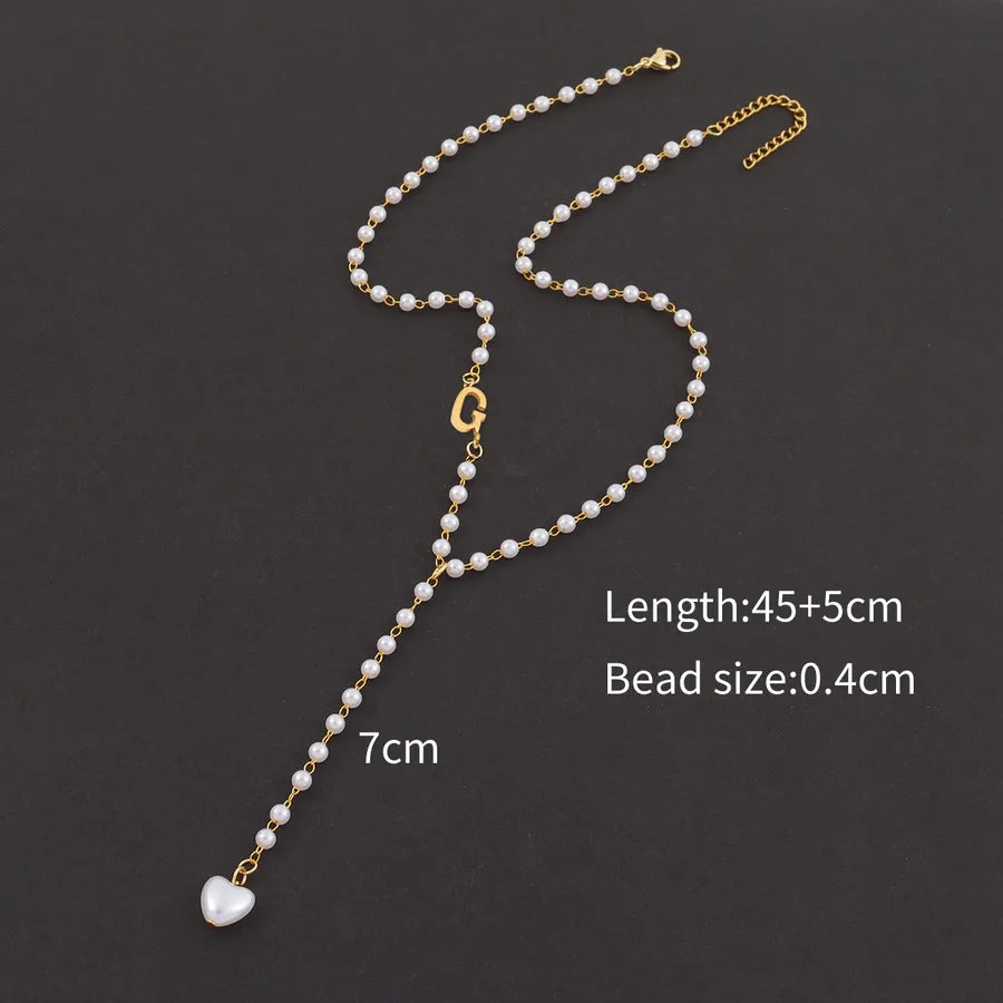 Casual Simple Style Classic Style letter Heart Shape 304 Stainless Steel Artificial Pearl Beaded Chain Y-necklaces Wholesale