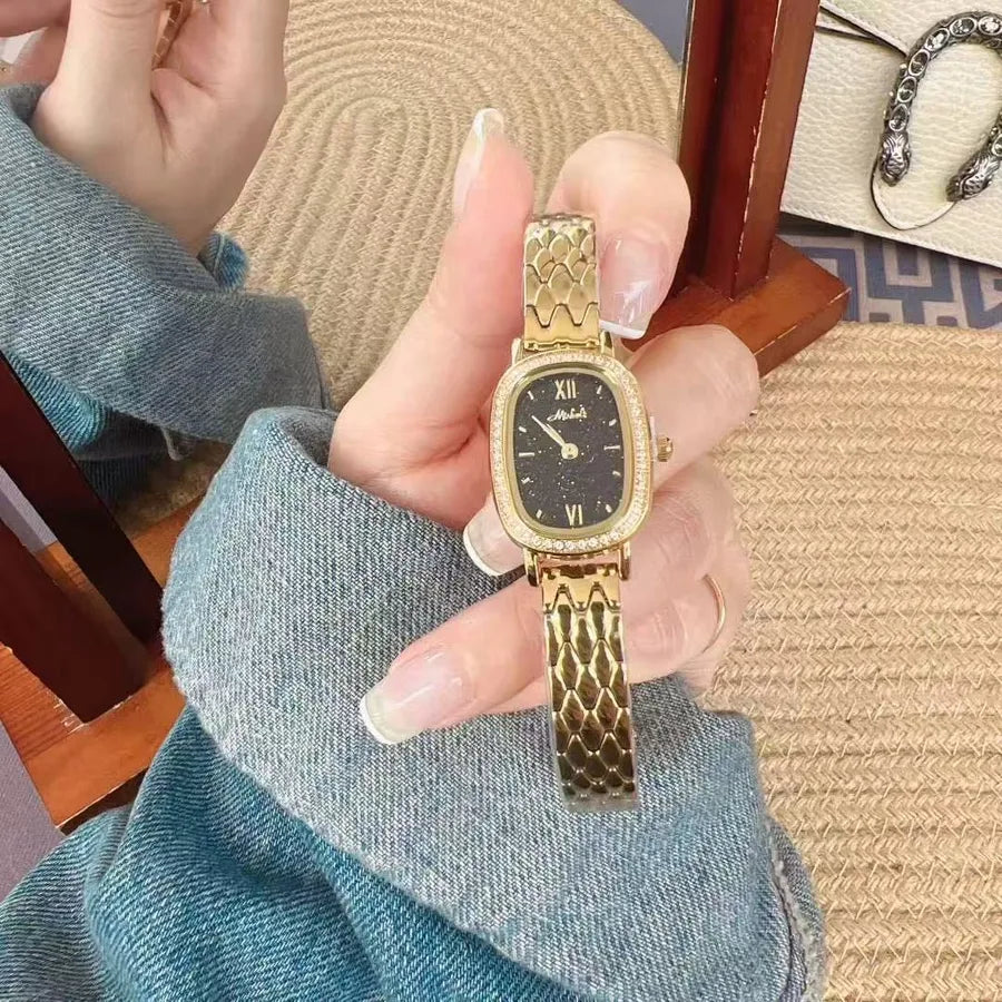 Gold Diamond Embedded Quartz Watch Elliptical Dial Starry Sky Ladies Fashionable Stainless Steel Strap Butterfly Buckle Clasp