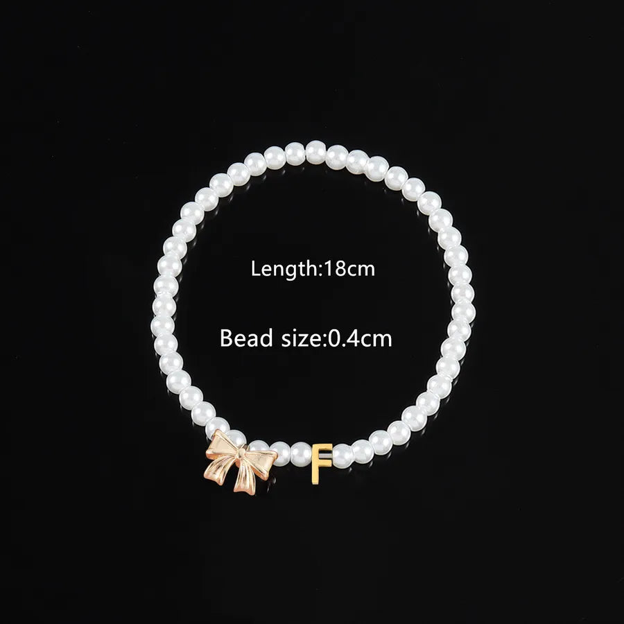 Elegant Classic Style Letter Bow Knot 304 Stainless Steel Artificial Pearl Copper Beaded Chain Beaded Bracelets Wholesale