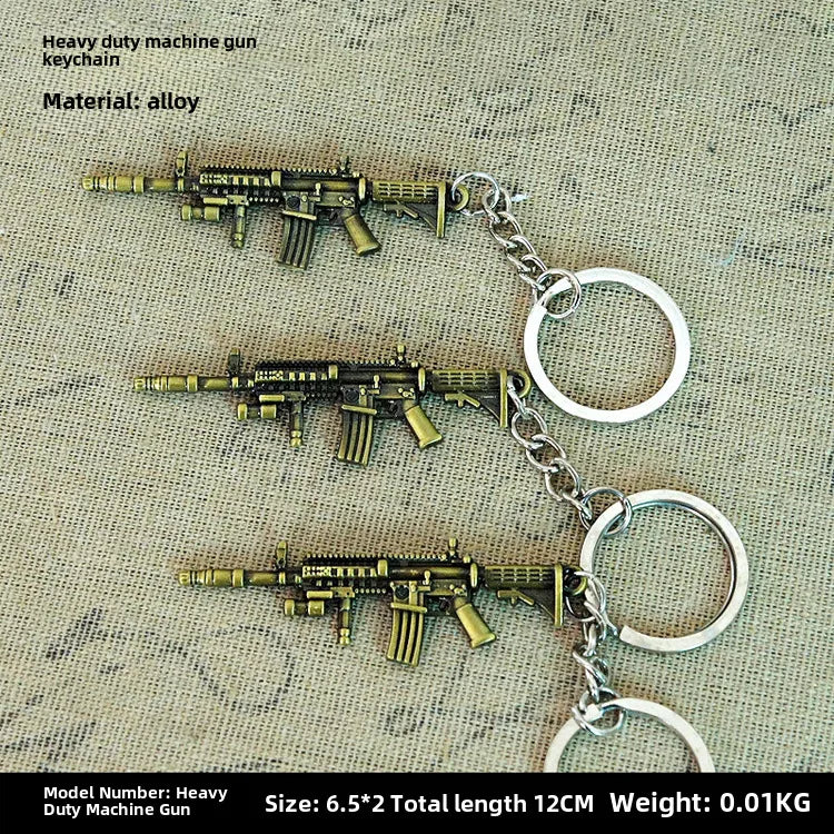 Factory sales metal simulation shell pistol tank aircraft hammer Bell ear spoon keychain uncle souvenir