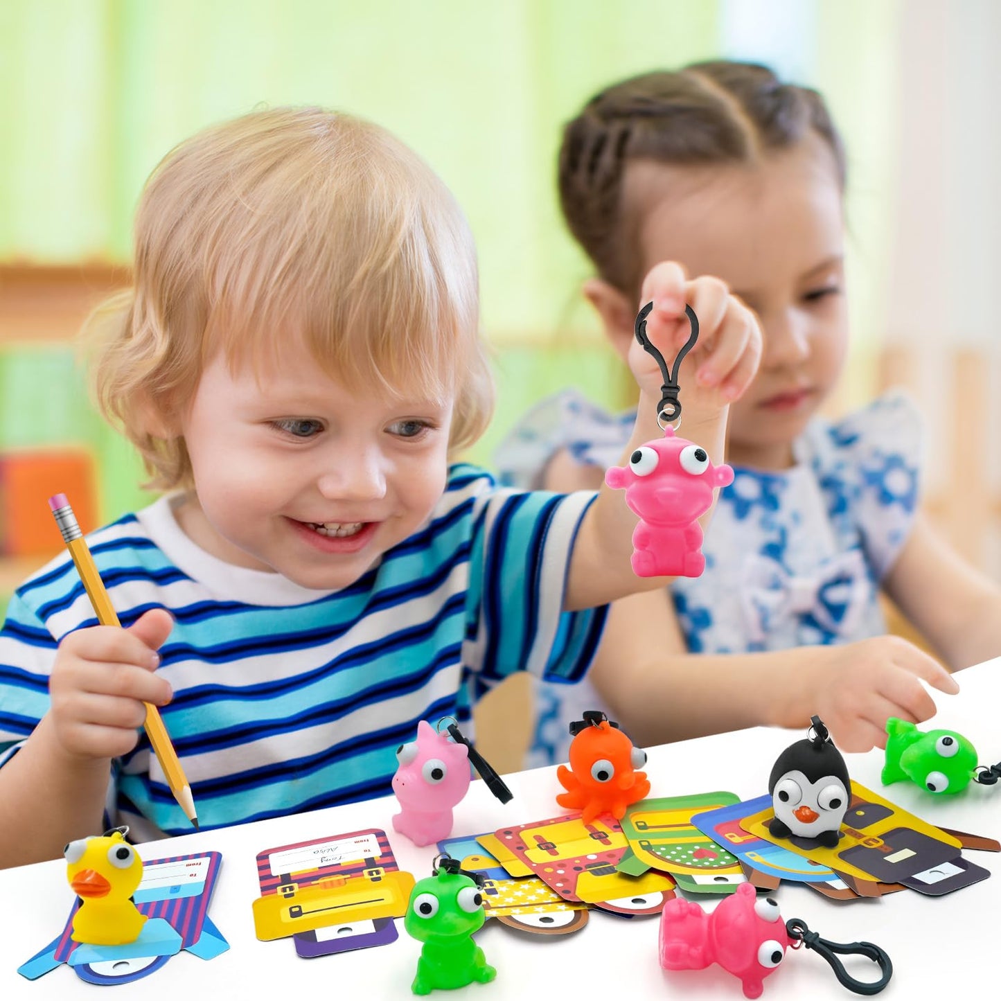 PIONJOY 28-Pack Valentines Cards with Eye-Pop Squeeze Keychains – Classroom Prizes & Gifts