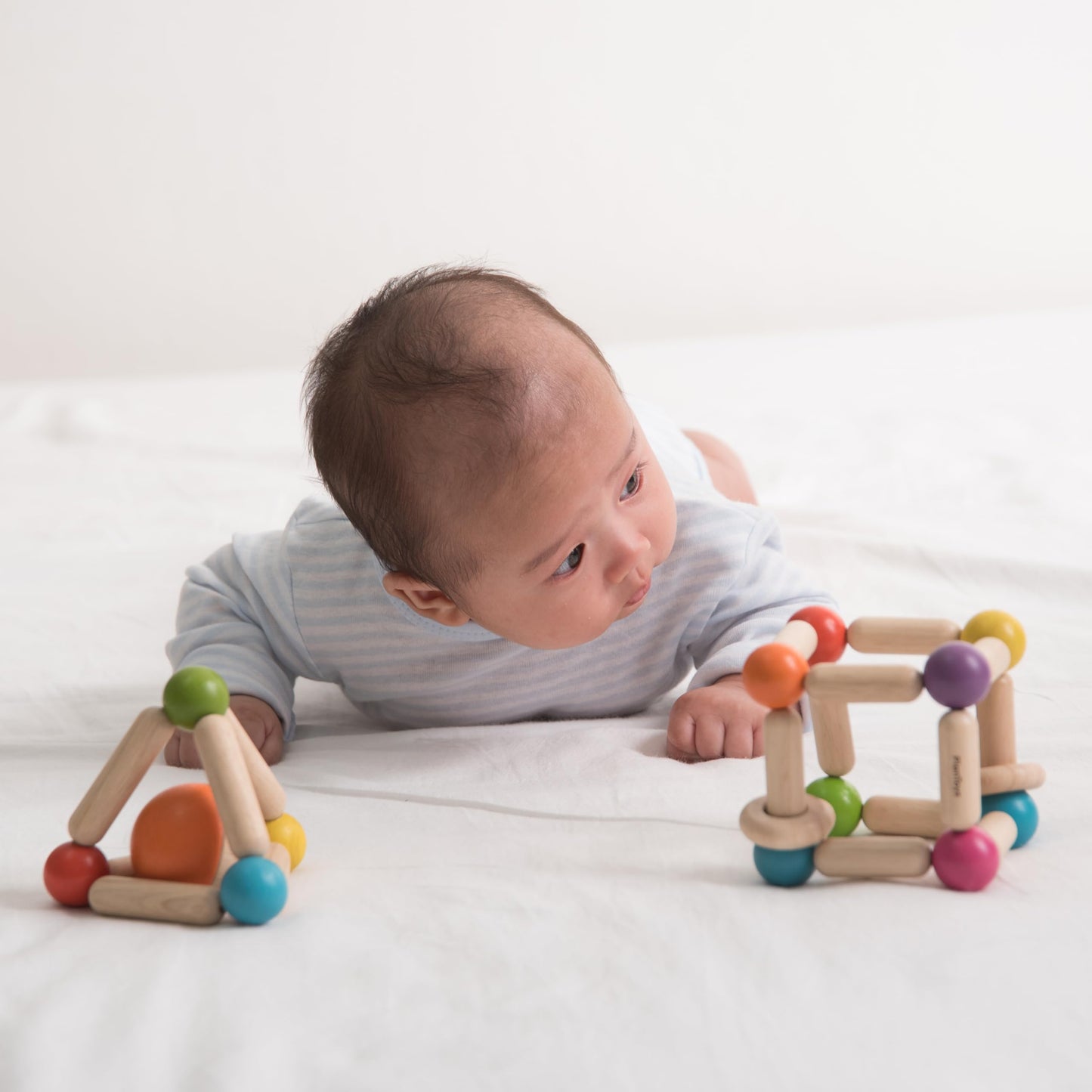 PlanToys Wooden Clutching Triangle Baby Toy with Gentle Sound – 5244 | Rubberwood & Non-Toxic Finish