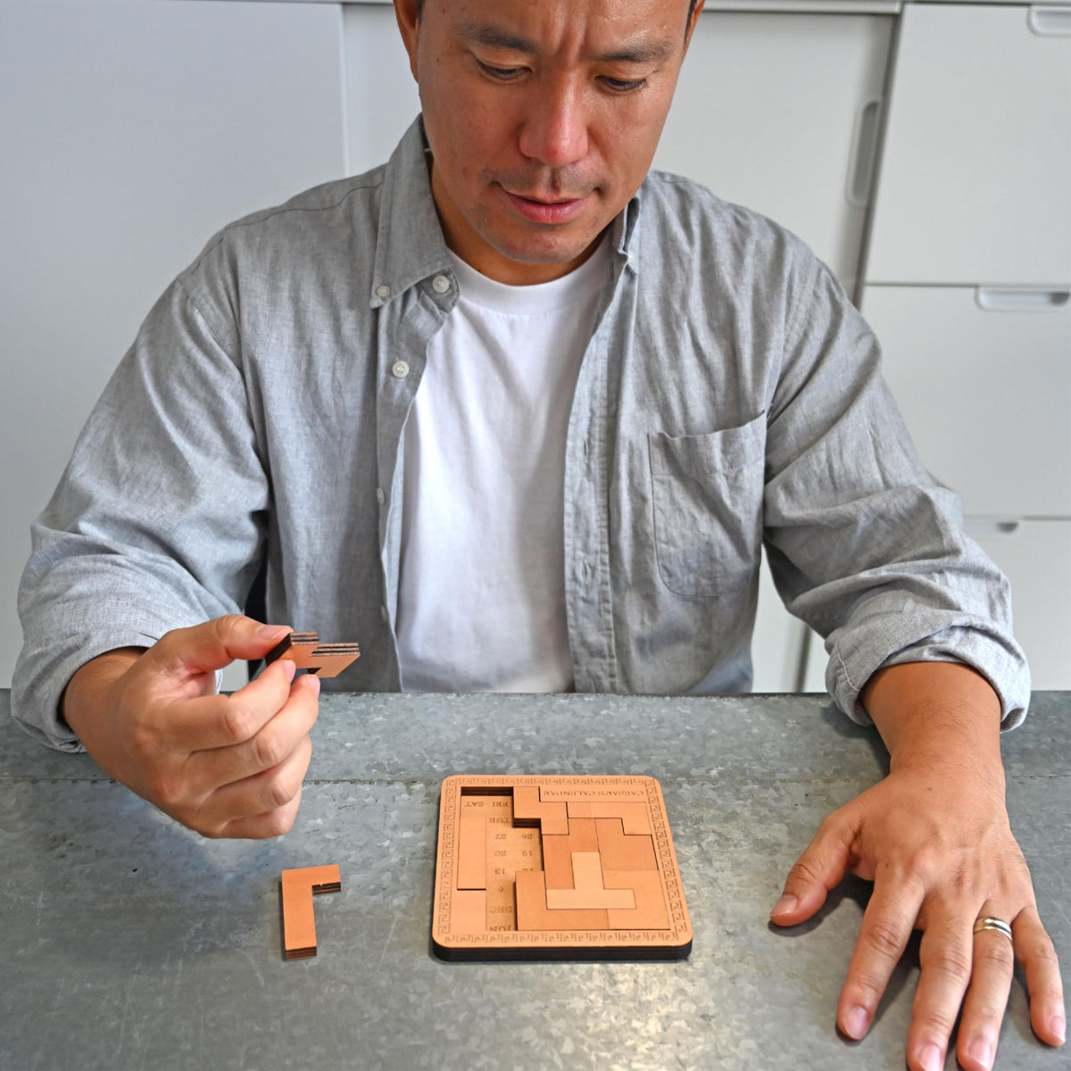Project Genius Caesar's Calendar: 365+ Daily Tangram Puzzles on a Laser-Cut Wood Desk Calendar