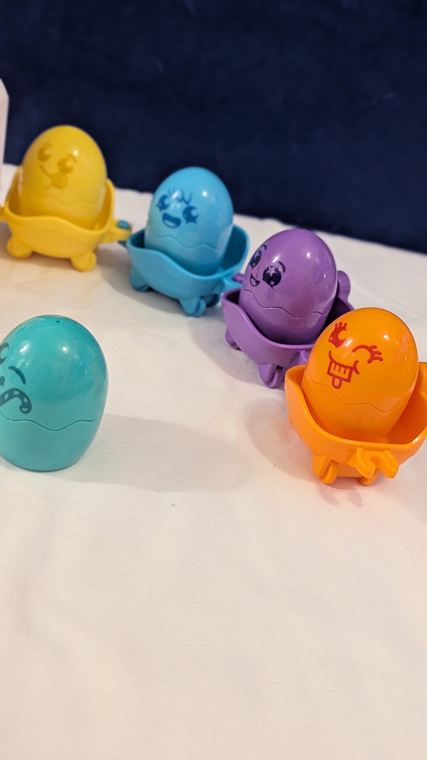 Tomy Toomies Hide n Squeak Egg Bus With Trailer