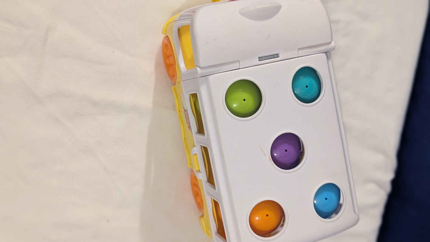 Tomy Toomies Hide n Squeak Egg Bus With Trailer