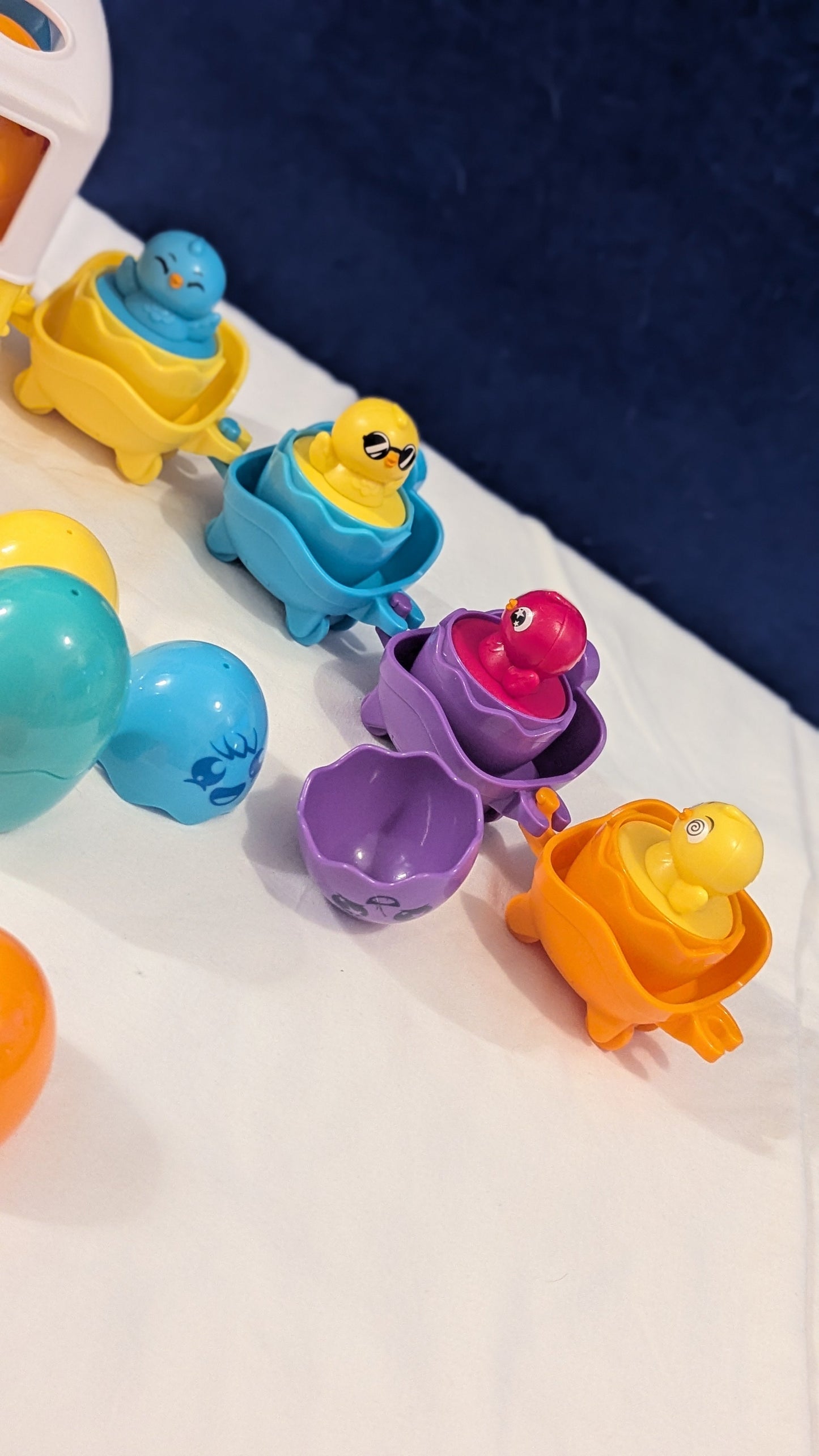 Tomy Toomies Hide n Squeak Egg Bus With Trailer