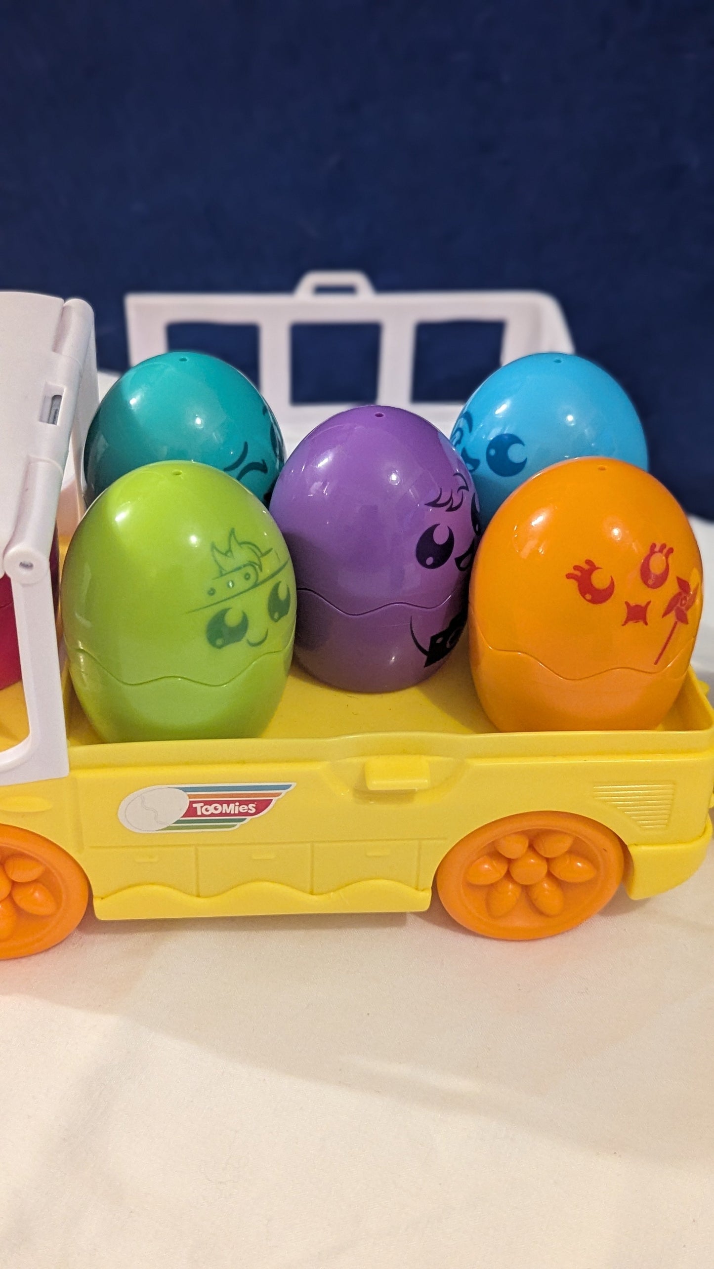 Tomy Toomies Hide n Squeak Egg Bus With Trailer