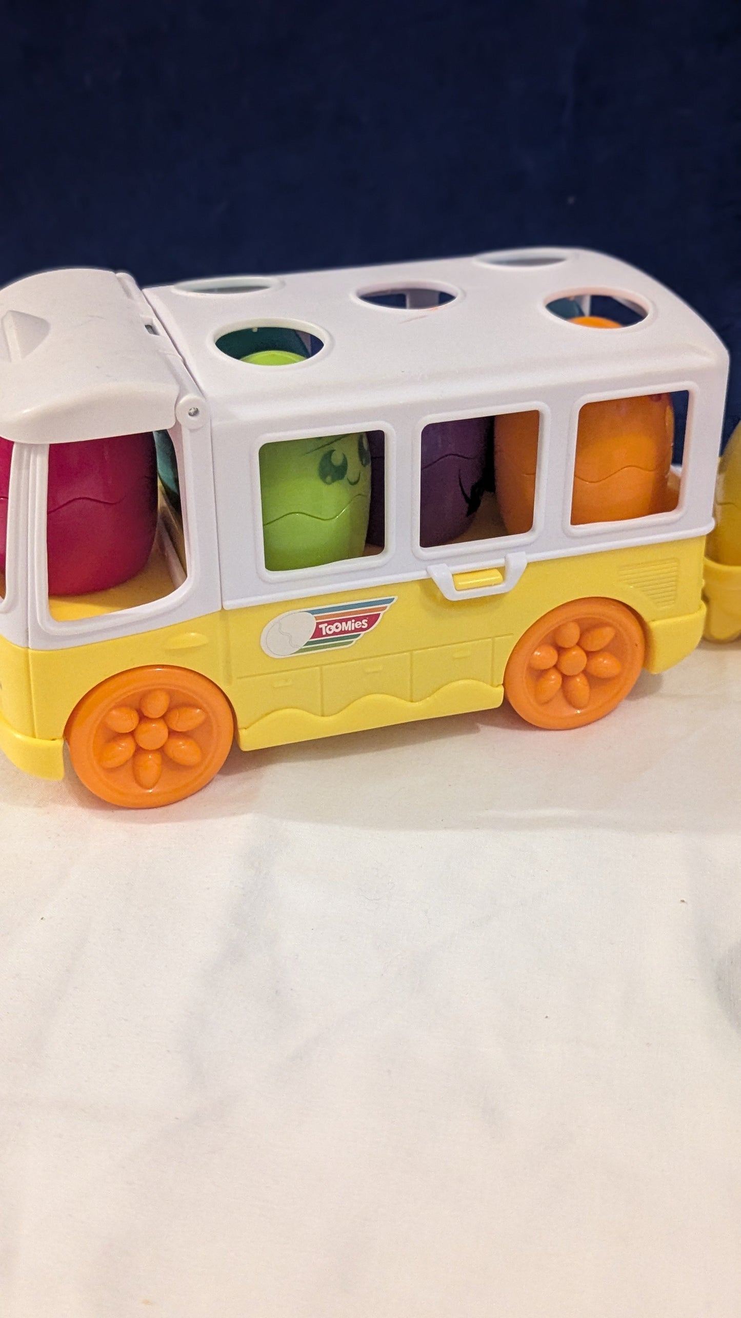 Tomy Toomies Hide n Squeak Egg Bus With Trailer