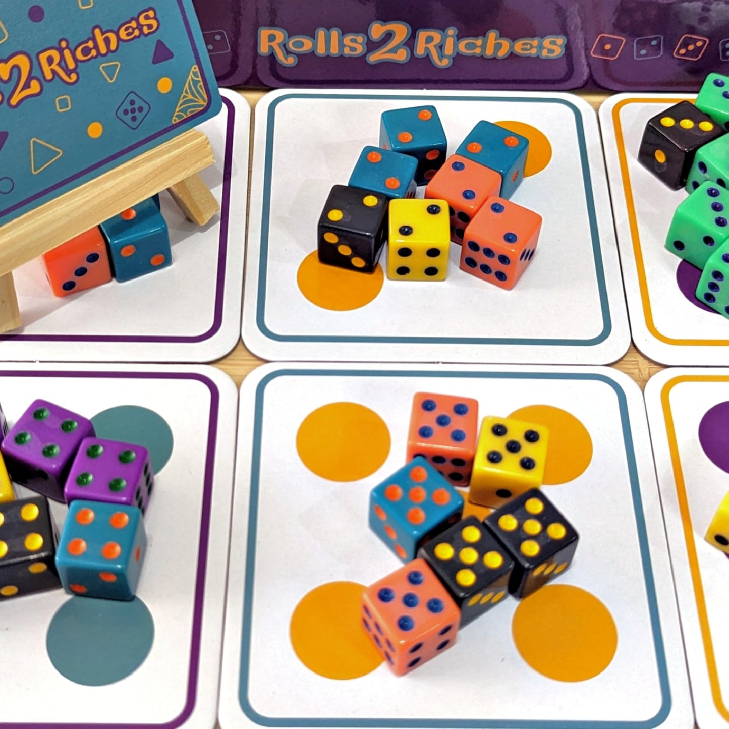 Rolls 2 Riches | Award-Winning Family Board Game | Fast-Paced Dice, Card & Strategy (2–6 Players)