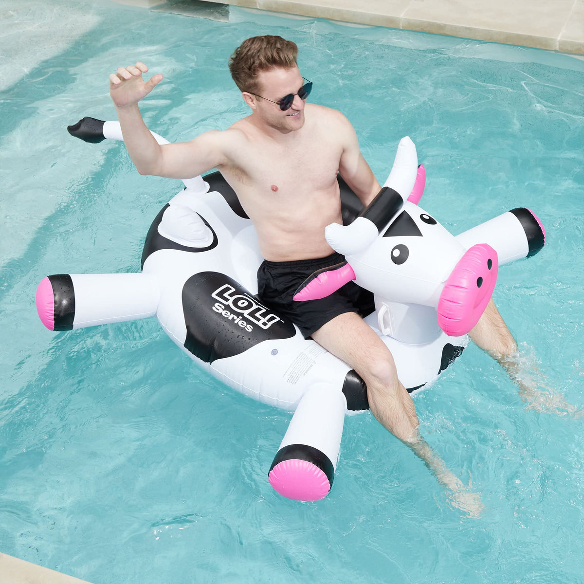 Swimline Original 90268 Giant Inflatable LOL Cow Pool Float – Ride-On Lounge with Stable Base