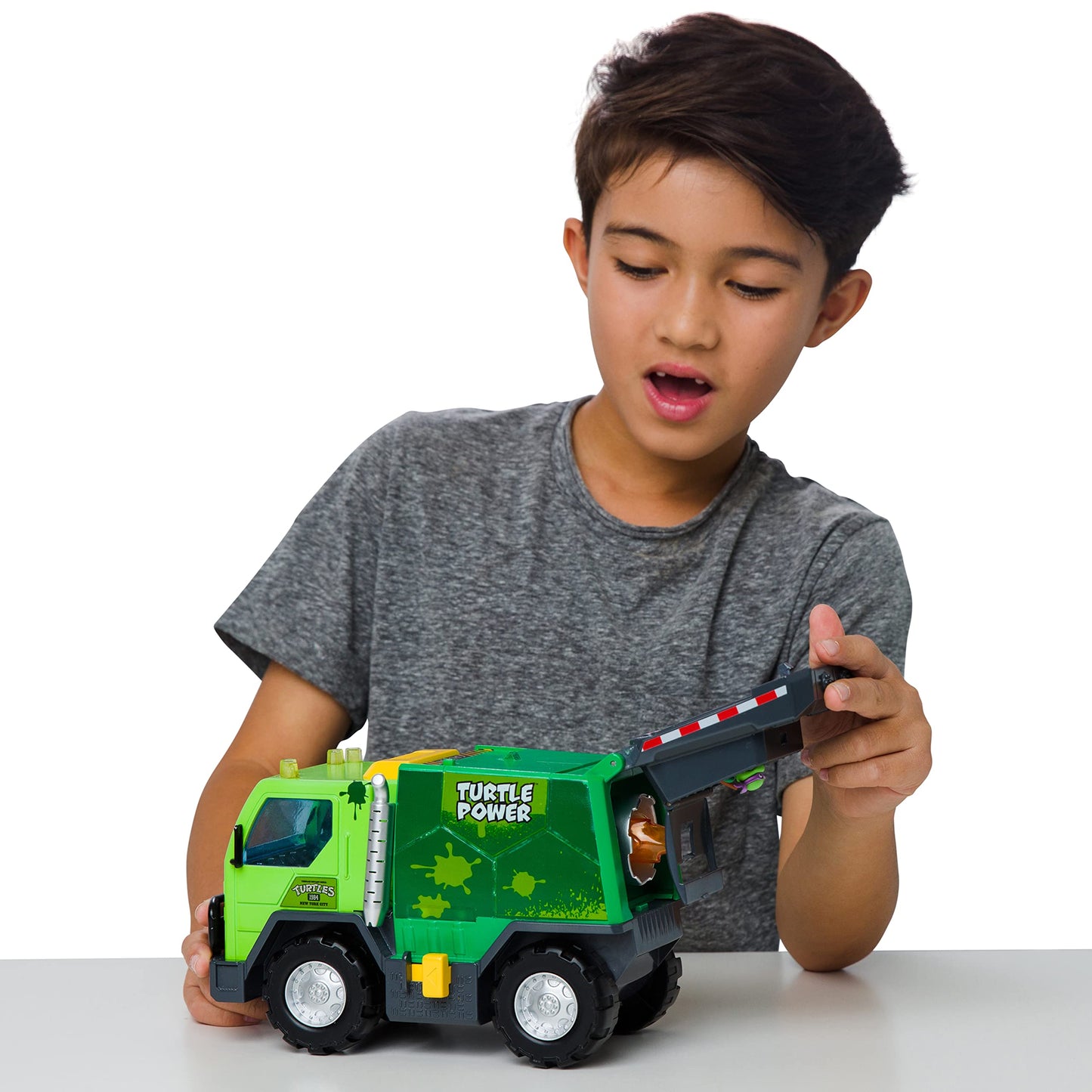 TMNT Thrash N’ Battle Garbage Truck with Lights, Sounds & Sewer Cap Launchers