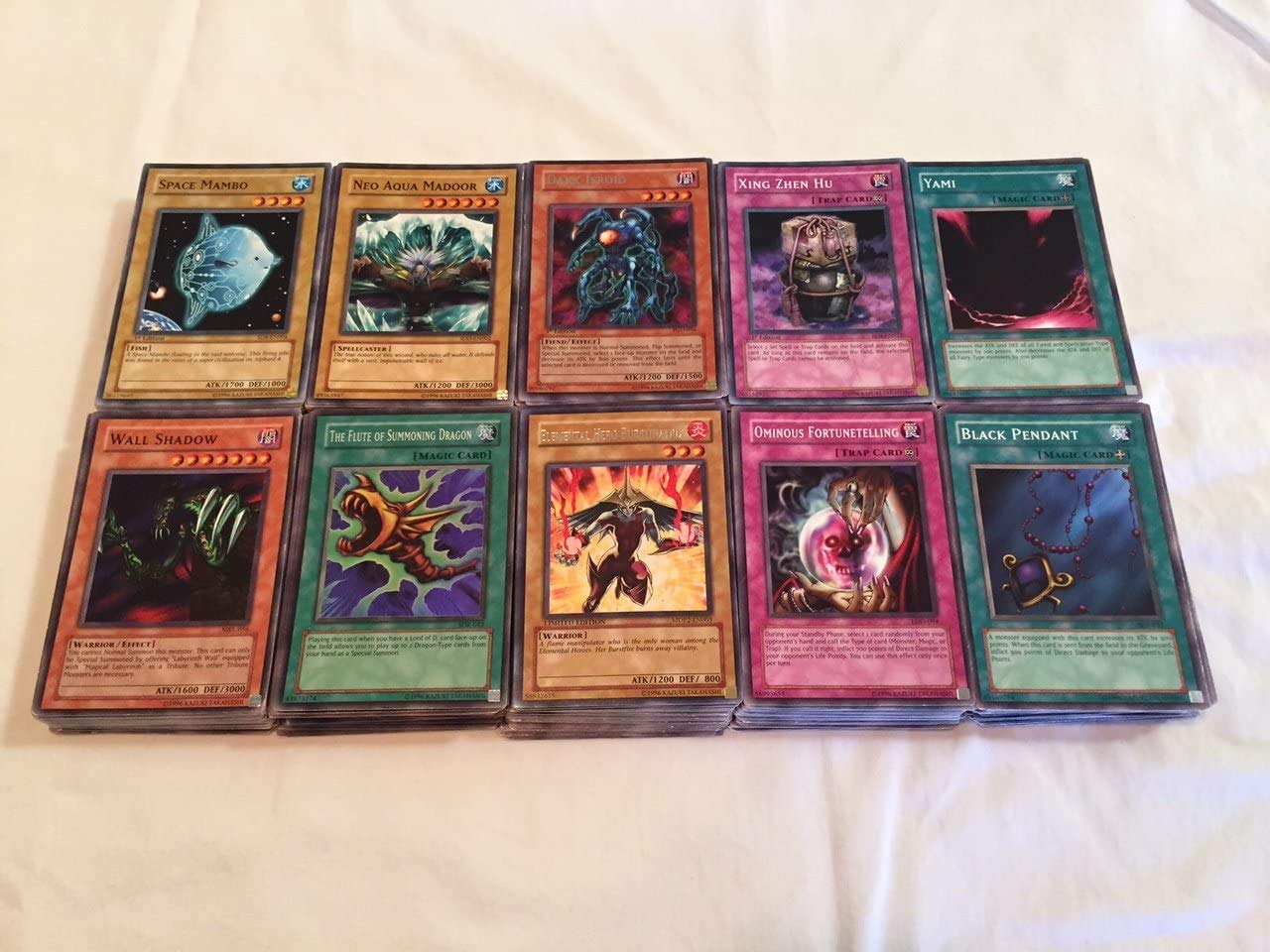 Yu-Gi-Oh! 500 Assorted Cards in Tin — Rare, Ultra Rare & Holographic + Sleeves
