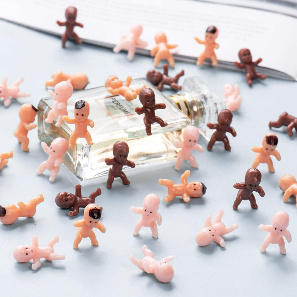 ZJJZGYXINTAI 120 Pcs Plastic Babies for Games – 1-Inch Mini Baby Figurines for Baby Shower, Ice Cubes, and King Cake Decor
